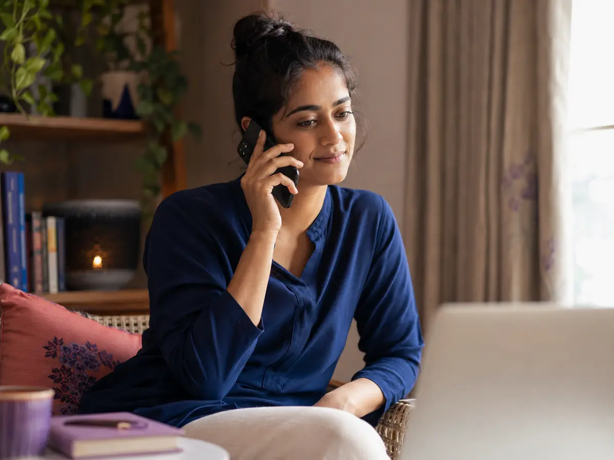 A professional beginning a private support conversation from home